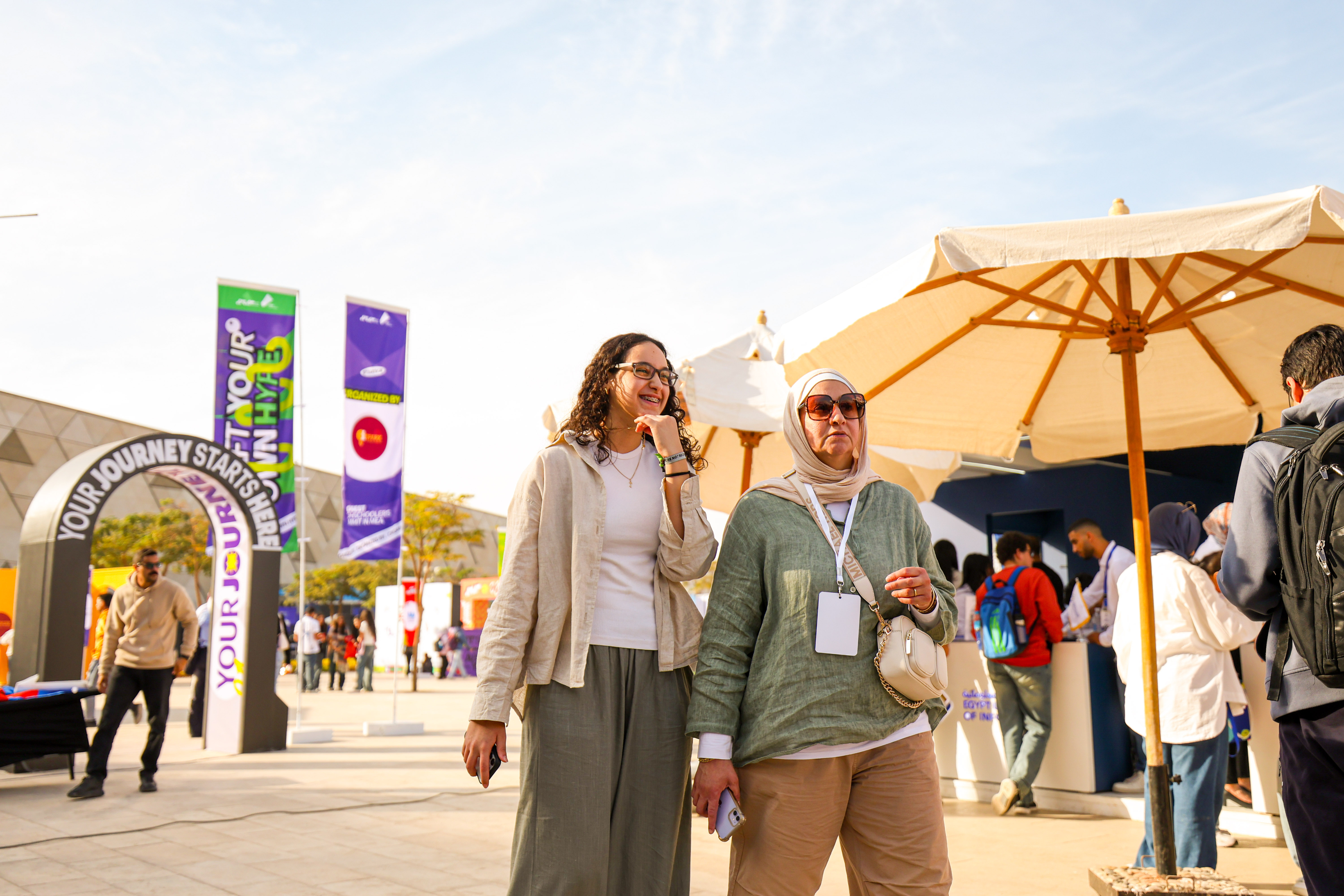 Students exploring a university fair
